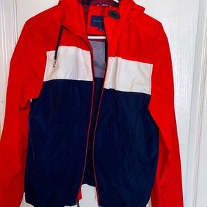 A Tommy Hilfiger wind breaker size medium worn a few times good condition